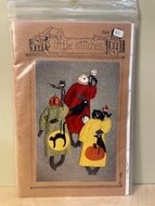 A trio of seasonal primitive dolls